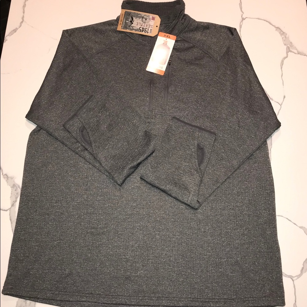 Men’s long sleeve, half zip w/pocket & thumb holes